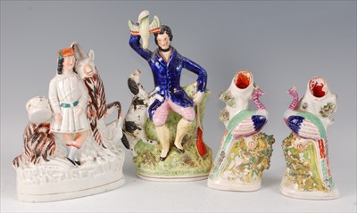 Lot 2057 - A Victorian Staffordshire figure of a...