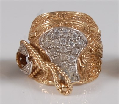 Lot 2168 - A heavy gent's 9ct gold saddle ring, in the...