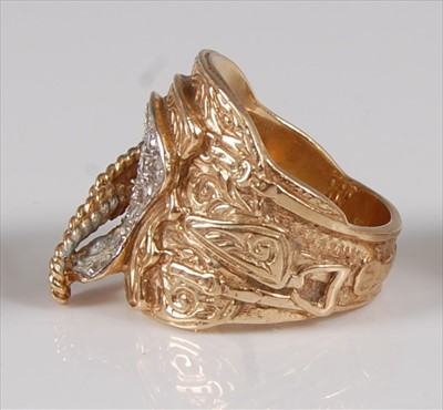 Lot 2168 - A heavy gent's 9ct gold saddle ring, in the...