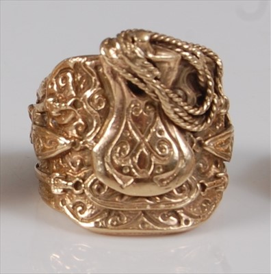 Lot 2169 - A heavy gent's 9ct gold saddle ring, in the...
