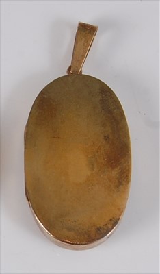Lot 2164 - A Japanese Meiji period yellow metal oval...