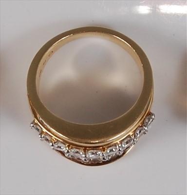 Lot 2190 - A contemporary 14ct gold diamond dress ring,...