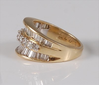 Lot 2190 - A contemporary 14ct gold diamond dress ring,...