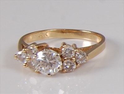 Lot 2188 - A 14ct gold diamond ring, the centre claw set...