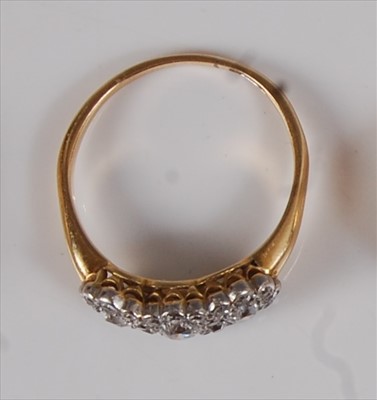Lot 2189 - A 14ct gold diamond cluster ring, arranged as...