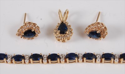 Lot 2154 - A contemporary 18ct gold, sapphire and diamond...