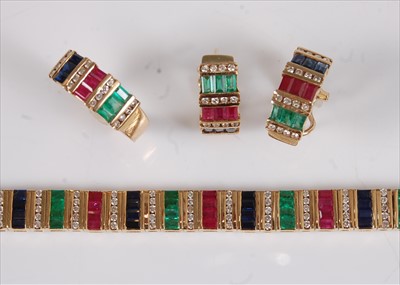 Lot 2152 - An 18ct gold multi-stone suite of jewellery,...