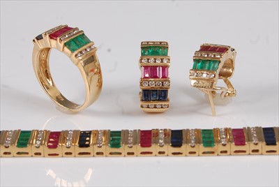 Lot 2152 - An 18ct gold multi-stone suite of jewellery,...
