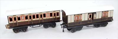 Lot 348 - Two Bing LNWR bogie coaches, brown and cream...