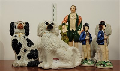 Lot 7 - A pair of double sided Staffordshire figures...