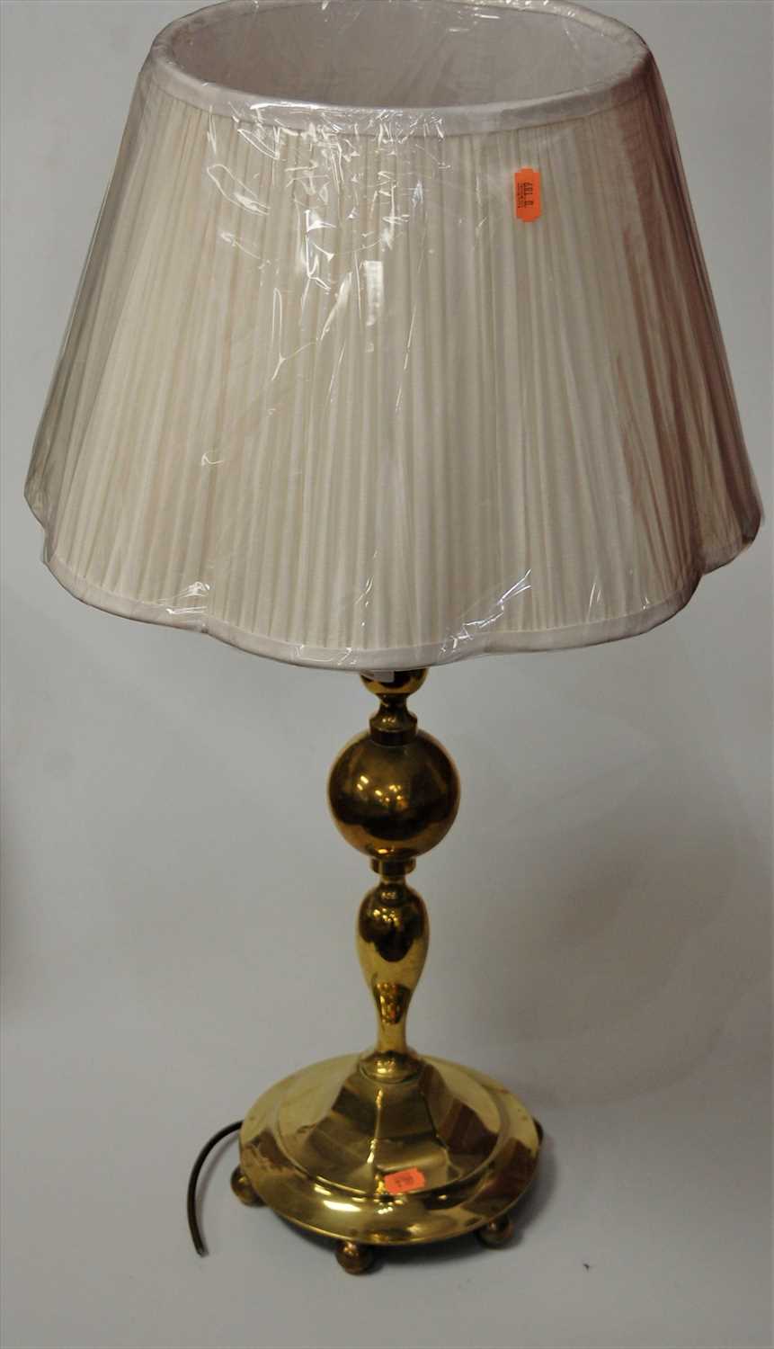 Lot 15 - A large turned brass table lamp having a...