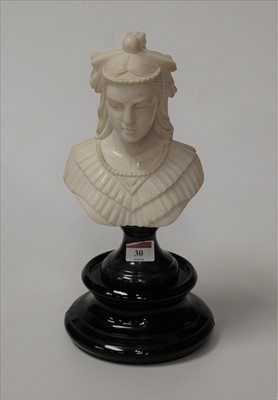Lot 34 - A carved marble female head and shoulders bust...