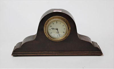 Lot 46 - A 1950s oak cased mantel clock having a...