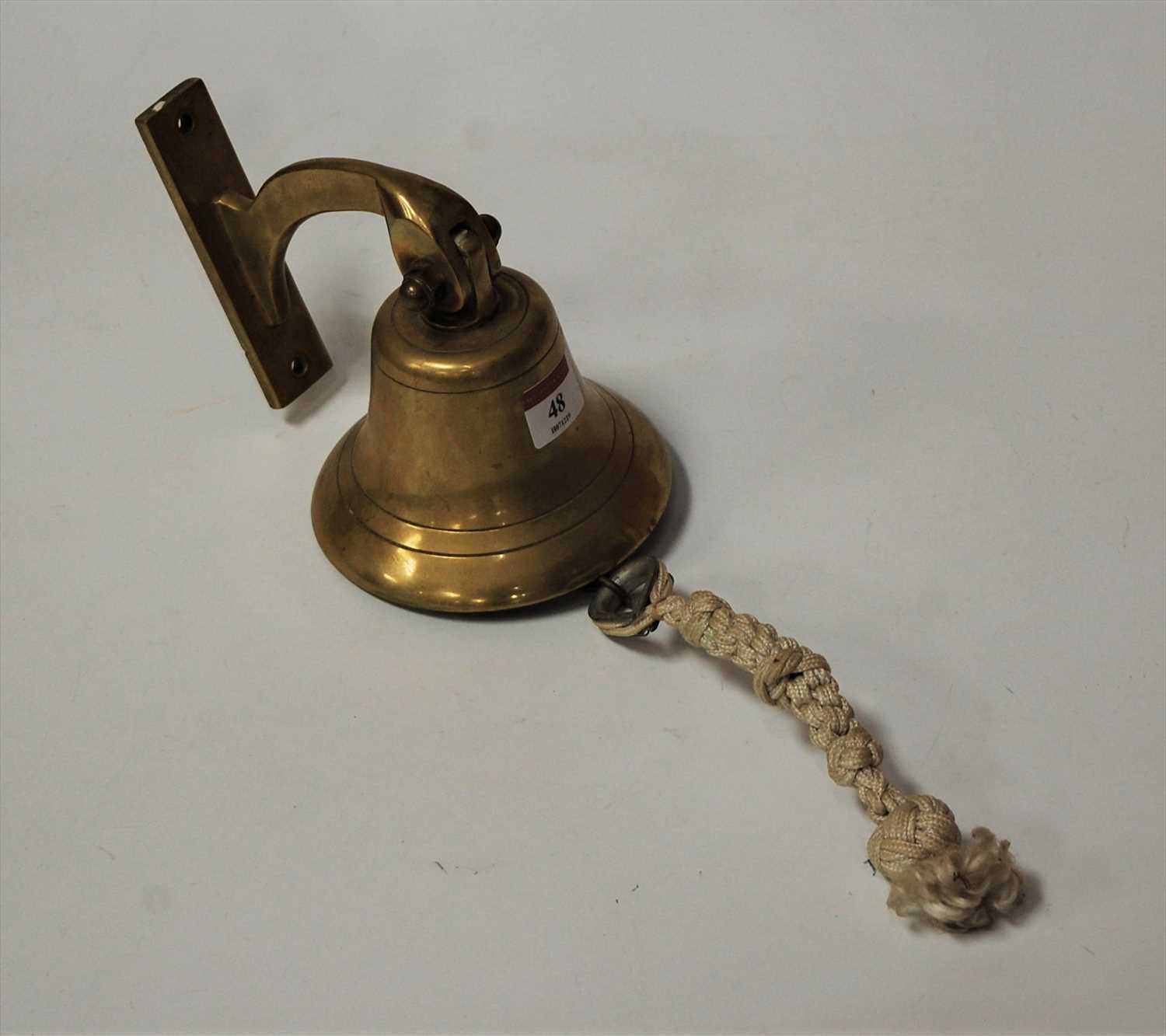 Lot 48 - A modern brass wall mounted bell