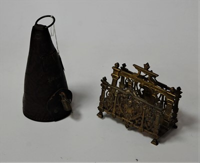 Lot 61 - A novelty leather money box together with a...