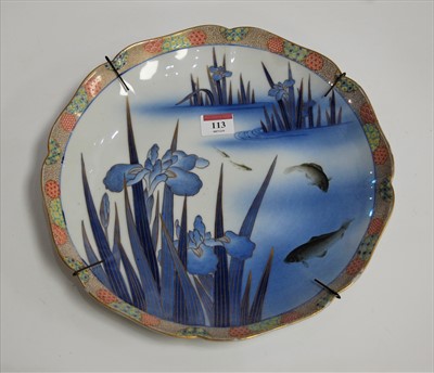 Lot 113 - A Japanese charger of scalloped circular form,...