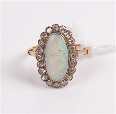 Lot 307 - An early 20th century yellow metal opal and...