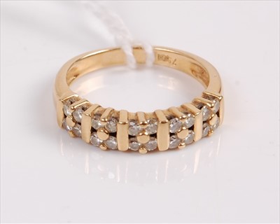 Lot 319 - A contemporary 18ct gold diamond half eternity...