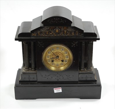 Lot 154 - A late Victorian black slate mantel clock...