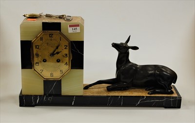 Lot 145 - A French Art Deco black marble and onyx cased...