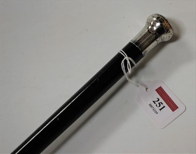 Lot 251 - A George V walking cane, having an ebony shaft...