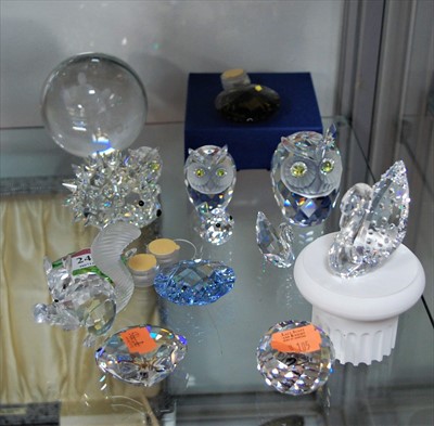 Lot 245 - A collection of Swarovski crystal ornaments to...