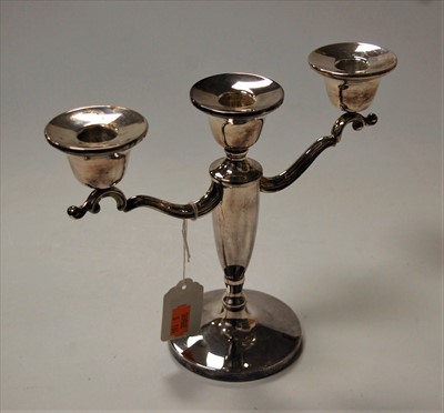 Lot 257 - A modern silver three-sconce table candelabra,...