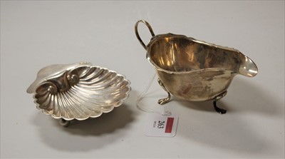 Lot 263 - A late Victorian silver scallop shaped butter...