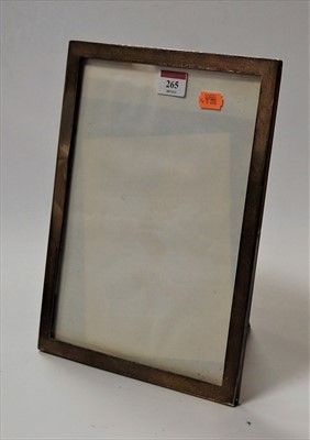 Lot 265 - A large George V silver clad photo frame of...