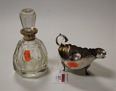 Lot 267 - An Edwardian silver sauceboat of plain...