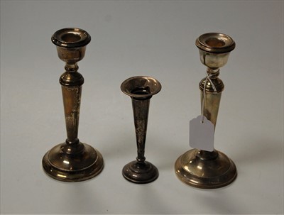 Lot 273 - A pair of modern silver table candlesticks,...