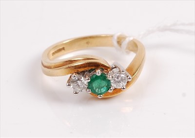 Lot 330A - A contemporary 18ct gold emerald and diamond...