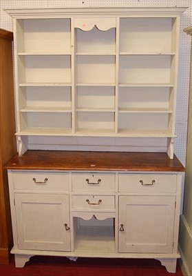 Lot 1108 - A stained and painted kitchen dresser, having...