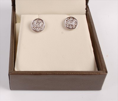 Lot 338 - A pair of contemporary 9ct white gold and...