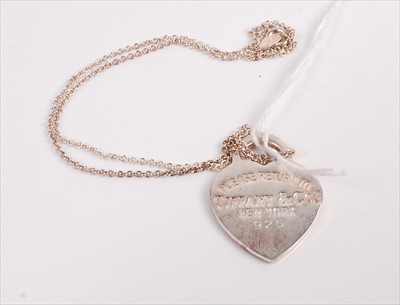 Lot 339 - A Tiffany & Co. silver identity pendant on...