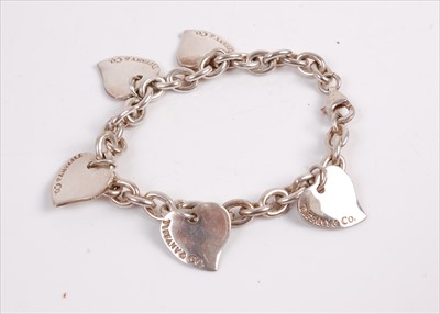 Lot 345 - A Tiffany & Co. silver bracelet having heart...