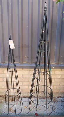 Lot 1127 - Three enamelled wirework obelisks