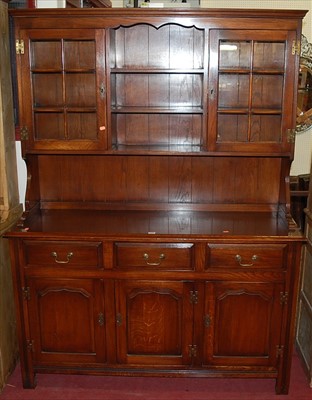 Lot 1134 - A contemporary oak dresser, in the 18th...