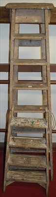 Lot 1140 - A rustic pine A-frame eight-step decorators...