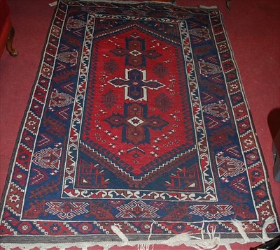 Lot 1143 - A Persian blue ground woollen rug, the...