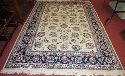 Lot 1144 - An Iranian Mashhad Sherkt cream ground woollen...