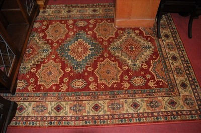 Lot 1151 - A contemporary Persian style mahcine woven red...