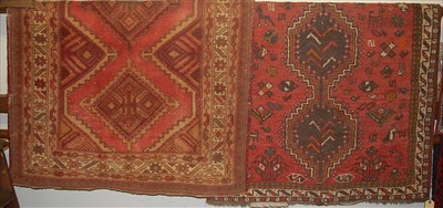 Lot 1161 - Two Persian woollen red ground rugs