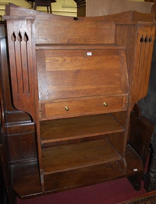 Lot 1192 - An early 20th century Liberty style oak...