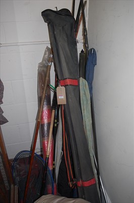 Lot 1174 - A collection of fly fishing rods, net,...