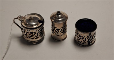 Lot 589 - A George V silver three piece cruet each of...