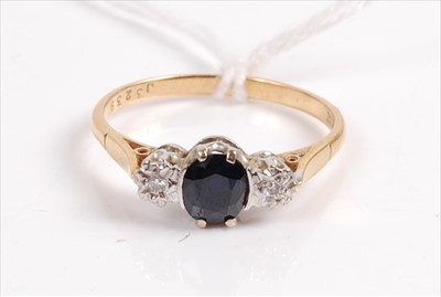 Lot 397 - An 18ct gold, sapphire and diamond ring, the...