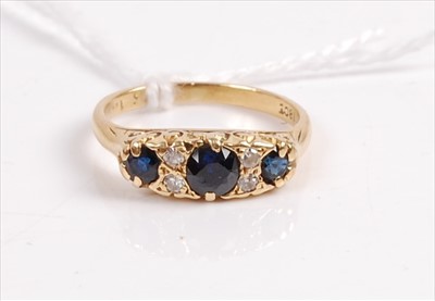 Lot 399 - A vintage 18ct gold, sapphire and diamond ring,...