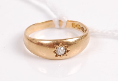 Lot 400 - An 18ct gold diamond solitaire ring, the old...