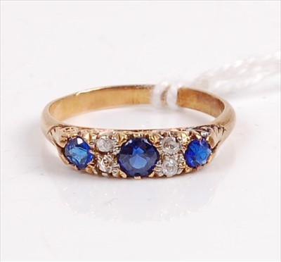 Lot 414 - An early 20th century 18ct gold, sapphire and...